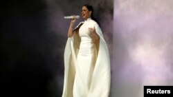 Katy Perry performs "By The Grace of God" at the 57th annual Grammy Awards in Los Angeles, California, Feb. 8, 2015. 