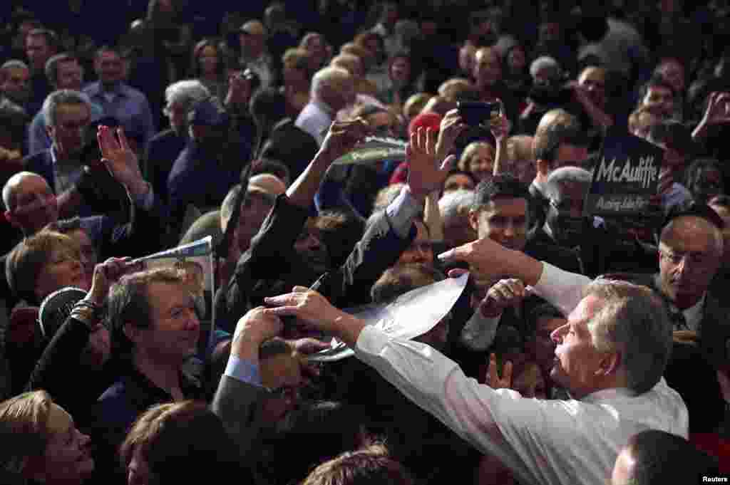 Virginia Democratic Governor-elect Terry McAuliffe greets supporters at his election night victory rally in Tyson's Corner, Nov. 5, 2013. 