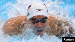 Caeleb Dressel of the United States in action in Men's 100m Butterfly, Tokyo, Japan, July 29, 2021.