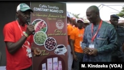 At the annual coffee festival, Cameroon officials encourage people to drink coffee, April 17, 2019, in Yaounde, Cameroon.