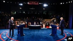 President Donald Trump and Democratic presidential candidate former Vice President Joe Biden participate in the final presidential debate at Belmont University, Oct. 22, 2020, in Nashville, Tenn.