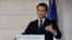 FILE - French President Emmanuel Macron delivers a press conference, in Paris, France, Feb. 25, 2021. 