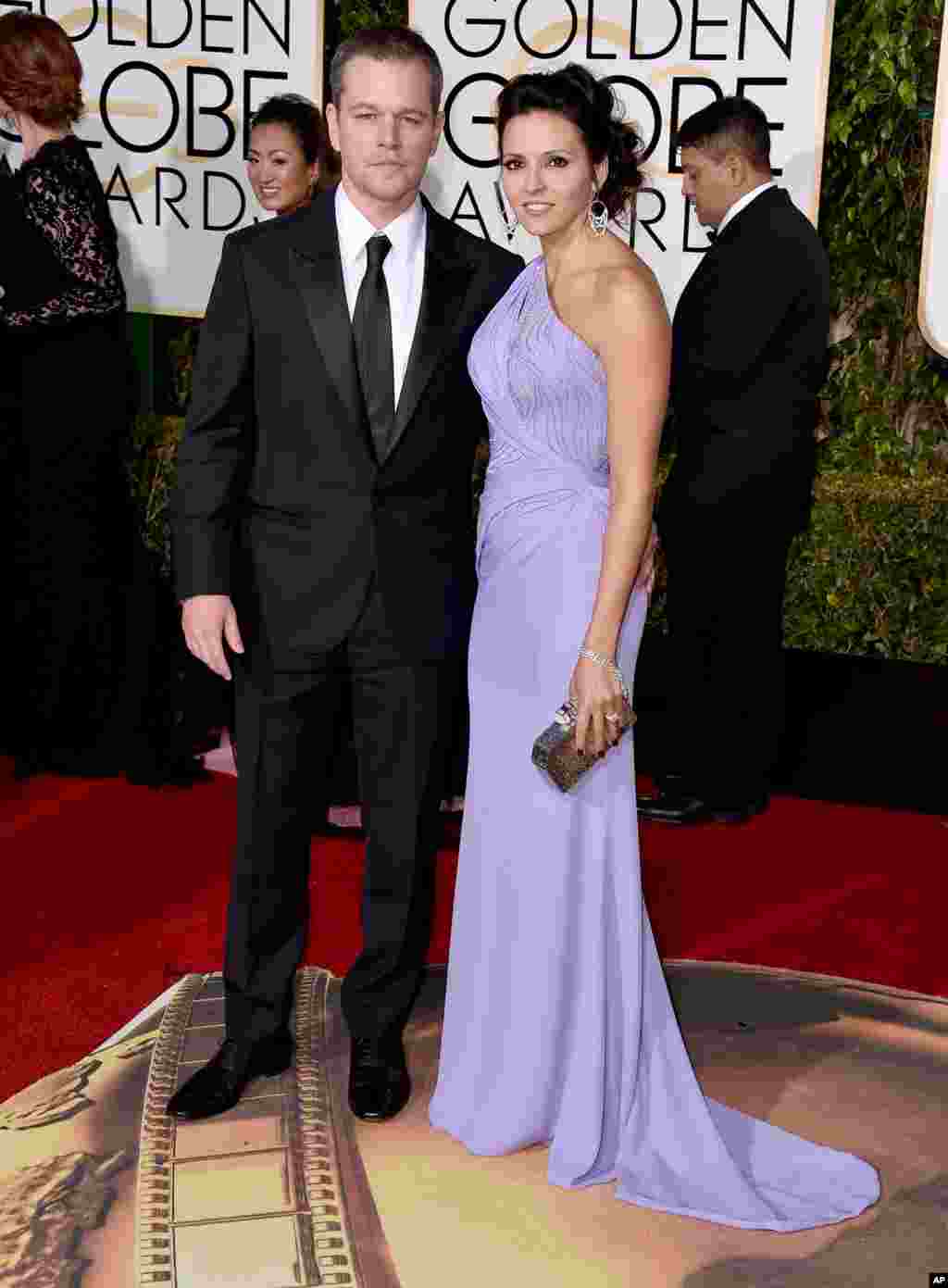 Matt Damon, left, and Luciana Barroso arrive at the 73rd annual Golden Globe Awards on Jan. 10, 2016, at the Beverly Hilton Hotel in Beverly Hills, Calif. 