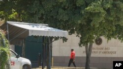 FILE - A man enters the U.S. embassy in Port-au-Prince, Haiti, March 10, 2024. A charter flight carrying dozens of U.S. citizens fleeing spiraling gang violence in Haiti landed Sunday, March 17, 2024, in Miami, U.S. State Department officials said. 