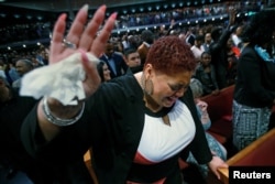 Jennifer Whitson cries during a service at the Potter's House church during Sunday service following the multiple police shootings in Dallas, Texas, U.S., July 10, 2016.