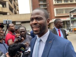 Nkululeko Sibanda, the Movement for Democratic Change spokesman, speaks to reporters in Harare, Nov. 20, 2019. (Columbus Mavhunga/VOA)