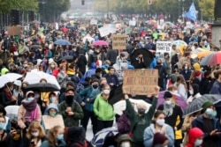 Fridays for Future activists protest calling for a "Global Day of Climate Action" in Berlin, Germany, Sept. 25, 2020.