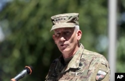 Commander of the Resolute Support mission and U.S. Forces in Afghanistan Army Gen. John W. Nicholson speaks during an opening ceremony of "Invictus Games" at the Resolute Support Headquarters, in Kabul, Afghanistan, May 13 , 2017.