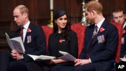 Britain's Prince William, left, Prince Harry and Meghan Markle attend a Service of Thanksgiving and Commemoration on ANZAC Day at Westminster Abbey in London, April 25, 2018. 