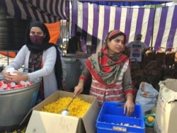 Women also help at the community kitchens that are a tradition in the Sikh faith. (Anjana Pasricha/VOA)