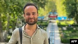 FILE - This undated handout photograph of Louis Arnaud was released on Jan. 26, 2023, by his family. French President Emmanuel Macron announced on Wednesday that Arnaud has been released.