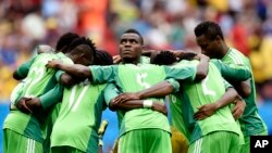Les Super Eagles, le 30 juin 2014 au Stade National de Brasilia, Brésil lors d'un match de la coupe du monde. (AP Photo/Martin Meissner)