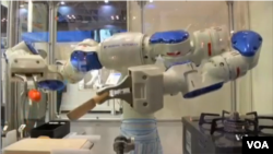 A Rohingya Muslim woman, Hanida Begum, who crossed over from Myanmar into Bangladesh, kisses her infant son, Abdul Masood, who died when the boat they were traveling in was capsized just before reaching the shore of the Bay of Bengal, in Shah Porir Dwip, Bangladesh.