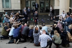 U.S. Ambassador to Russia John Sullivan speaks to the media at the Moscow City Court building after the verdict announcement for American Paul Whelan in Moscow, Russia, June 15, 2020.