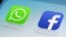 FILE - WhatsApp and Facebook app icons on a smartphone. 