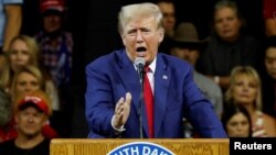 Mantan Presiden AS Donald Trump berbicara dalam rapat umum partai Republik di kota Rapid City, South Dakota 8 September 2023. 