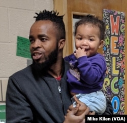 Abu Bakar of Des Moines brings his own children to Genesis programs after it helped him feel like he belonged and learn to communicate more effectively.