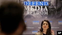 FILE - Attorney Amal Clooney participates in a panel discussion on media freedom at U.N. headquarters, Sept. 25, 2019. 