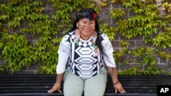 Munduruku leader Alessandra Korap poses at the Fairmont Hotel in San Francisco, Wednesday, April 19, 2023. (AP Photo/Eric Risberg)