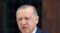 Turkey's President Recep Tayyip Erdogan speaks to the media after Friday prayers, in Istanbul, Aug. 20, 2021. 
