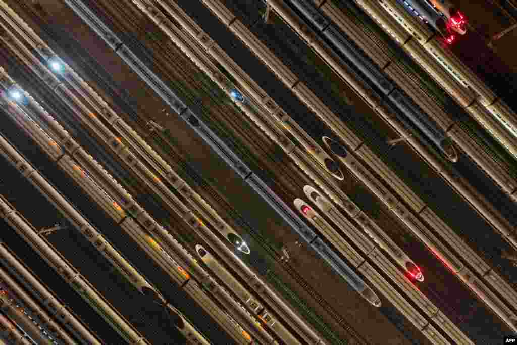 High speed trains are seen outside a maintenance workshop in Nanjing, in China&#39;s eastern Jiangsu province.