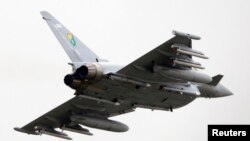 FILE - A British Eurofighter EF-2000 Typhoon takes off from Gioia del Colle NATO airbase in southern Italy.