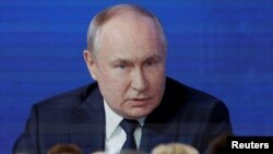 Russian President Vladimir Putin meets with his confidants for the 2024 election in Moscow