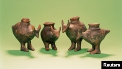 Late Bronze Age feeding vessels from Vosendorf, Austria, are seen in this image released on September 25, 2019. A study in the journal Nature found that similar vessels were used to feed milk to babies. (Enver-Hirsch/Wien Museum/Handout via REUTERS)