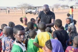 FILE - Kalidou Sy, France 24 correspondent in Burkina Faso, is pictured during pre-coronavirus days. (Courtesy of Kalidou Sy)