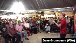 Fahmi Fadzil (pictured right) is part of opposition coalition Pakatan Harapan.