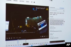 Draft One, an AI powered software that creates police reports from body cam audio, is demonstrated on a screen at Oklahoma City police headquarters on Friday, May 31, 2024 in Oklahoma City, Oklahoma. (AP Photo/Nick Oxford)