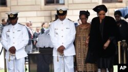 Nelson Mandela's widow Graca Machel leaves after viewing the casket at the Union Buildings in Pretoria, Dec. 11, 2013.