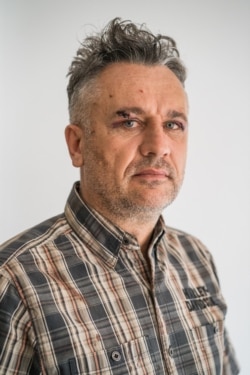 Tiberui Bosutar is seen in a photo taken after he and fellow crew members were attacked by unidentified assailants. (Courtesy: Greenpeace/Ioana Moldovan)