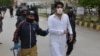 Doctors in Pakistan Province Stage Strike to Press Demands Amid Virus Outbreak  
