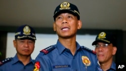 Philippine National Police Director General Ricardo Marquez reads statement on the beheading of Canadian hostage John Ridsdel by Muslim extremist Abu Sayyaf, Quezon city, April 26, 2016.
