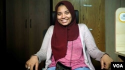 Mai Hisham, 24, says she believes veils please God and wearing a hijab is part of her right to express herself. "I feel that it makes me looks like myself enough,” she says. “It’s a part of my character.” Cairo, July 30, 2016. (H. Elrasam/VOA)