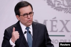 FILE - Mexico's Economy Minister Ildefonso Guajardo speaks to the media during a news conference at Los Pinos presidential residence in Mexico City, Mexico, May 1, 2018.