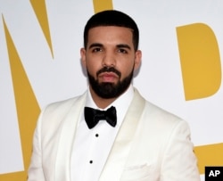 FILE - Canadian rapper Drake arrives at the NBA Awards in New York.