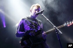 FILE - Tyler Joseph and Twenty One Pilots performs at the Big Ticket Fest at Metropolitan Park in Jacksonville, Florida.