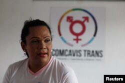 Karla Avelar, executive director of the Association for Communicating and Training Trans Women, poses for a picture at her office in San Salvador, El Salvador, May 12, 2017.