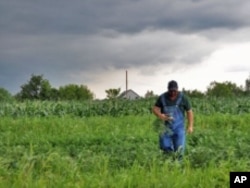 Farmer Rusty Lee supplies fresh meat and produce to the Old North Grocery Co-op.