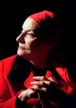 FILE - In this January 27, 1998, file photo, Alicia Alonso, founder of the Ballet Nacional de Cuba, listens during an interview in New York. (AP Photo/Bebeto Matthews, File)