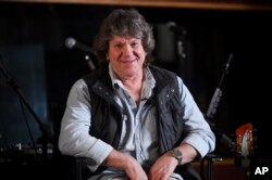 FILE - Woodstock co-producer and co-founder, Michael Lang, participates in the Woodstock 50 lineup announcement at Electric Lady Studios, March 19, 2019, in New York.