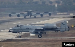 FILE - A U.S. Air Force A-10 Thunderbolt II fighter jet lands at Incirlik airbase in the southern city of Adana, Turkey, Dec. 10, 2015.