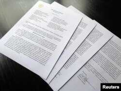 Pismo sekretara za pravosuđe Williama Barra upućeno članovima Kongresa, sa osnovnim zaključcima izvještaja specijalnog tužioca Roberta Muellera.