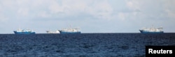 FILE - Chinese vessels are pictured in disputed South China Sea, April 21, 2017.