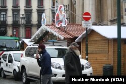 Despite remaining at the highest security alert levels, Brussels prepares for its annual Christmas markets, Nov. 24, 2015.