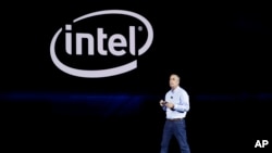 l CEO Brian Krzanich delivers a keynote speech at CES International, Jan. 8, 2018, in Las Vegas.