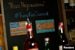 A bar sells a cocktail named "Peace Negroniations" to commemorate a US-DPRK summit at Tannin Wine Bar in Hanoi, Vietnam February 20, 2019. REUTERS/Kham