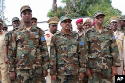 Somali President Mohamed Abdullahi Mohamed, center, attends a celebrations marking the 57th anniversary since Somali military was founded , in Mogadishu, Somalia, April 12, 2017.
